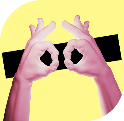 Person mit Ananas auf dem Kopf trägt eine Brille mit Lottokugeln